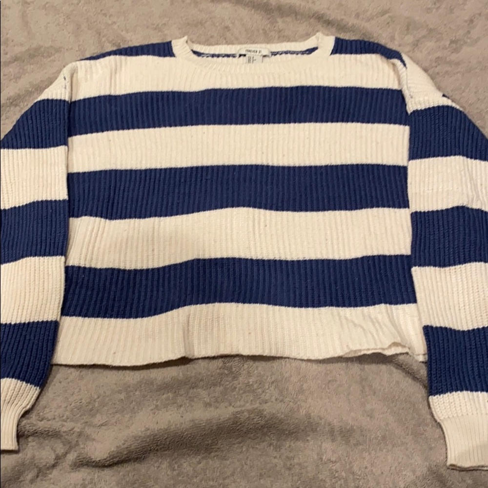 A striped blue and whit butted long sleeve